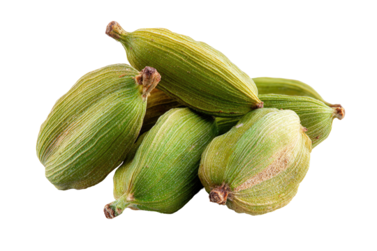 Close-up of cardamom pods.  Fresh, light green pods clustered together.  Distinct ribbed texture.  Sharp focus on pods against black background