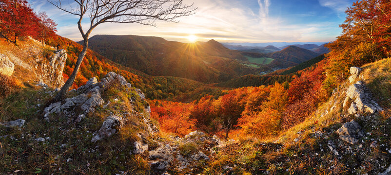Autumn sunrise in the Carpathian mountains. Big cliff in mountain - Slovakia.