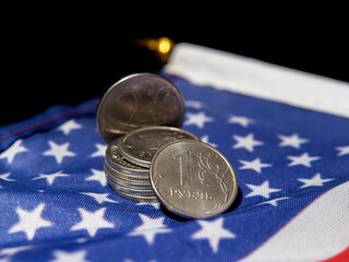 Russian Rubles Stacked on American Flag Background