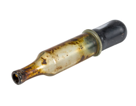 Old rusty glass dropper pipette, vintage medical laboratory tool with stained tube and rubber bulb on isolated background