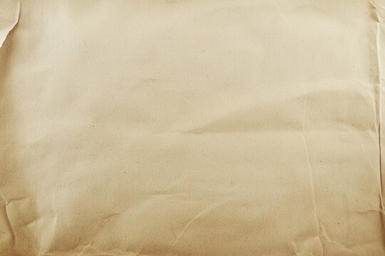 Piece of paper placed on top of another piece of paper on a flat surface
