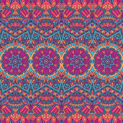 Festive colorful mandala art pattern. Geometric medallion doodle Boho style ornament. Psychedelic background art.
