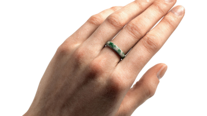 PNG of Close-up of a hand wearing a beautiful green jade ring, highlighting elegance and craftsmanship.