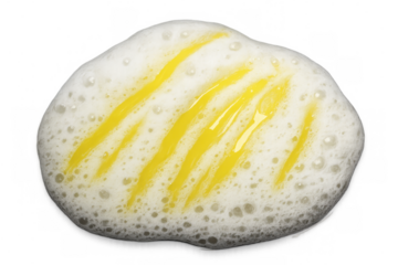 White soap foam and suds with yellow liquid detergent creating a cleansing texture. Transparent background