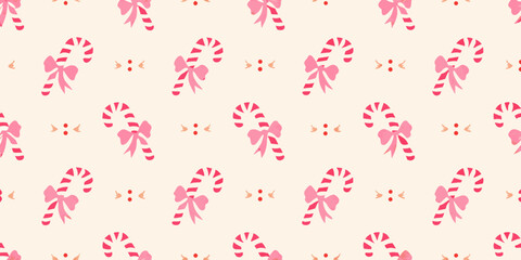 Cute pink candy cane and festive face pattern for christmas and holidays