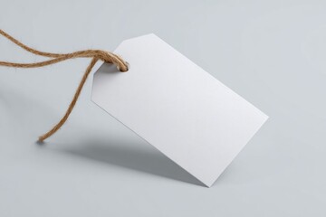 Blank tag with twine on surface