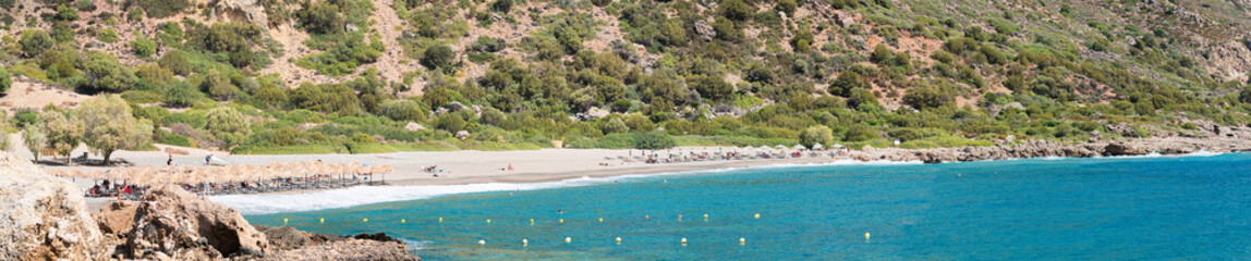Scenic View of Gianiskari Beach with Turquoise Sea and Hills