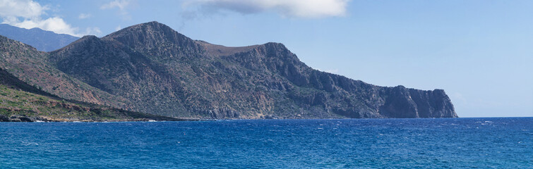 Rocky Coastal Mountains and Blue Sea in Crete Greece