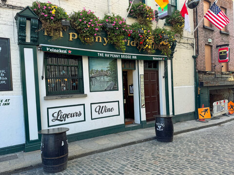 Dublin, Ireland - October 22, 2025: Entrance of The Ha'Penny Bridge Inn, Dublin.