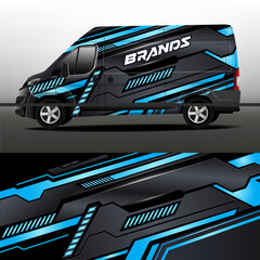 Car decal. Wrap design vector livery. Black background with blue and gray abstract stripes for car decal. Vehicle design development for a company. Delivery van vector design. 