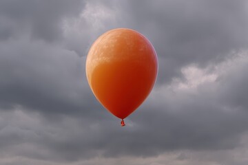 A single orange balloon floats against a dramatic stormy sky