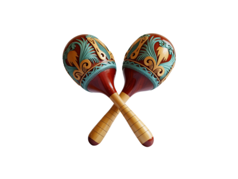 Two ornate wooden maracas crossed, traditional folk percussion instrument