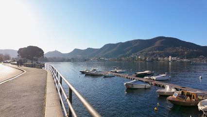 Lake Como Promenade with Boats and Mountains
