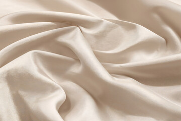 Obraz premium Silky Beige Waves: Close Up of Elegant Smooth Fabric with Gentle Undulations for Fashion or Interior Design