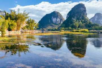 Naklejka premium Drone view of E'Quan spring (Goose Pond) karst landscape in winter in Jingxi Guangxi, China