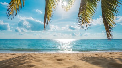 Tropical Beach Paradise with Palm Leaves and Sunlit Ocean Waves image photo