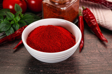 Spicy dry paprika powder in the bowl