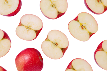 Close-up of many halved red apples, arranged in a repeating pattern on a black background.  Each apple half reveals a pale yellow core