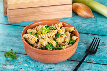 Italian vegan pasta fusilli with broccoli
