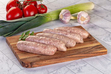 Raw pork sausages for grill