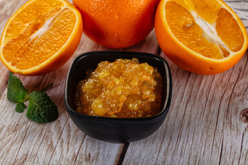 Sweet orange jam in the bowl