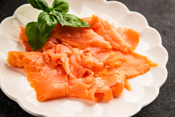 Smoked salmon fish seafood portion size natural product tasty snack fresh delicious gourmet food background on the table rustic top view copy space pescetarian diet