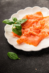 Smoked salmon fish seafood portion size natural product tasty snack fresh delicious gourmet food background on the table rustic top view copy space pescetarian diet