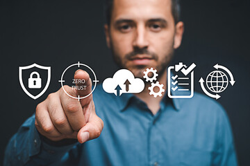 Man activating zero trust security system with cloud computing automation compliance and global network icons on a virtual interface for modern cybersecurity solutions and data protection