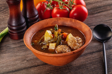 Tomato Soup with meatballs and vegetables