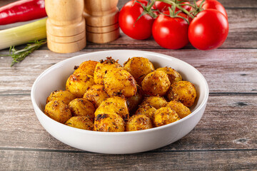 Baked small baby potato with herbs