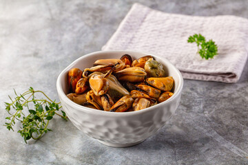 Peeled mussels heap in the bowl