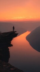 Silhouette of a person at the edge of a cliff, contemplating life decisions during a beautiful sunrise