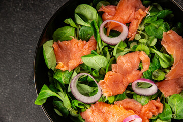 Salmon Salad appetizer seafood fresh fish second course portion size natural product tasty snack fresh delicious gourmet food background on the table rustic top view copy space pescetarian diet