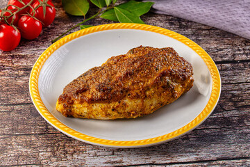 Baked chicken breast with spices and herbs
