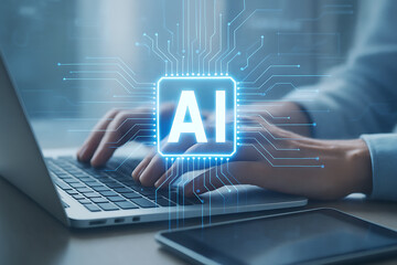 Business hands typing on laptop with glowing artificial intelligence hologram symbolizing digital innovation machine learning and technology