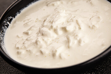 Stracciatella cheese soft young portion size Italian food natural product tasty snack fresh delicious gourmet food background on the table rustic top view copy space