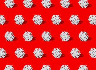 Repeat Winter Snowflake Pattern on a Red Background