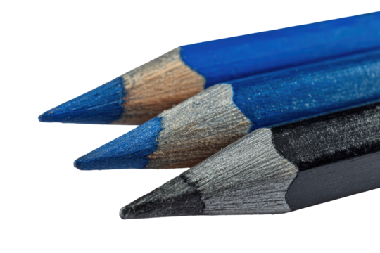 Close-up of three colored pencils' points