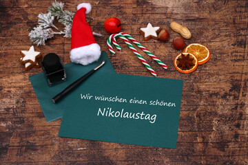 Glückwunschkarte mit Grüßen zum Nikolaustag. Wir wünschen einen schönen Nikolaustag.	