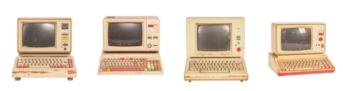 Collection of four vintage portable computers with small screens and keyboards, isolated on transparent background