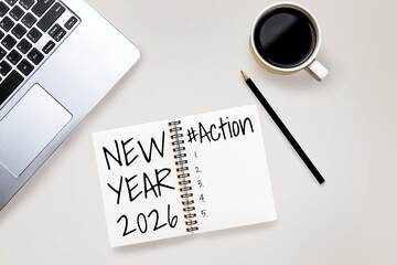 2026 Happy New Year Resolution Goal List and Plans Setting - Business office desk with notebook written about plan listing of new year goals and resolutions setting. Change and glee concept.