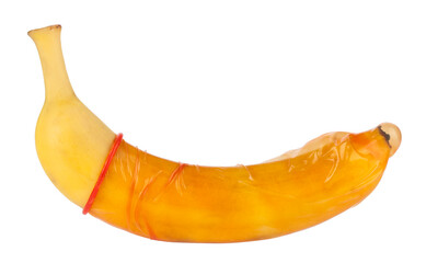 Banana in a condom isolated on white background.