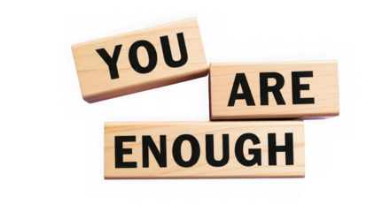 Wooden blocks spell out affirmation you are enough