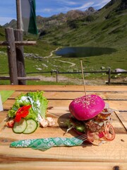 Gourmet Burger with Pink Bun at Mountain Hut near Giglachsee, Schladming