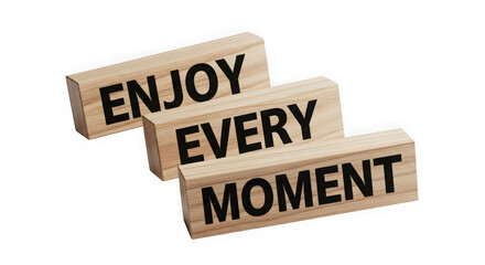 Wooden blocks spell out inspirational message enjoy every moment