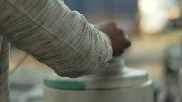 Water Pouring from Traditional Copper Lota Vessel