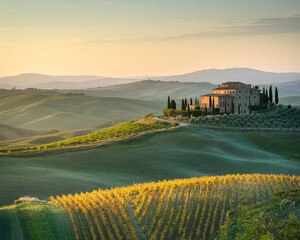 Tuscan villa and vineyards at sunset tuscany italy