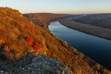 Peaceful autumn landscape in the Republic of Moldova with colorful forests, golden trees, and...