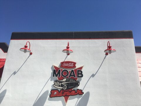 Moab, UT, USA - 6 July 2018:  Exterior of the popular restaurant Moab Diner on Main Street in one of Utah's most touristy towns.