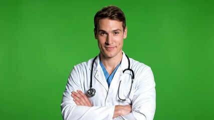 Confident, Handsome, Young Professional Doctor on a Green Screen Chroma Key Background. Stock Video Footage.
